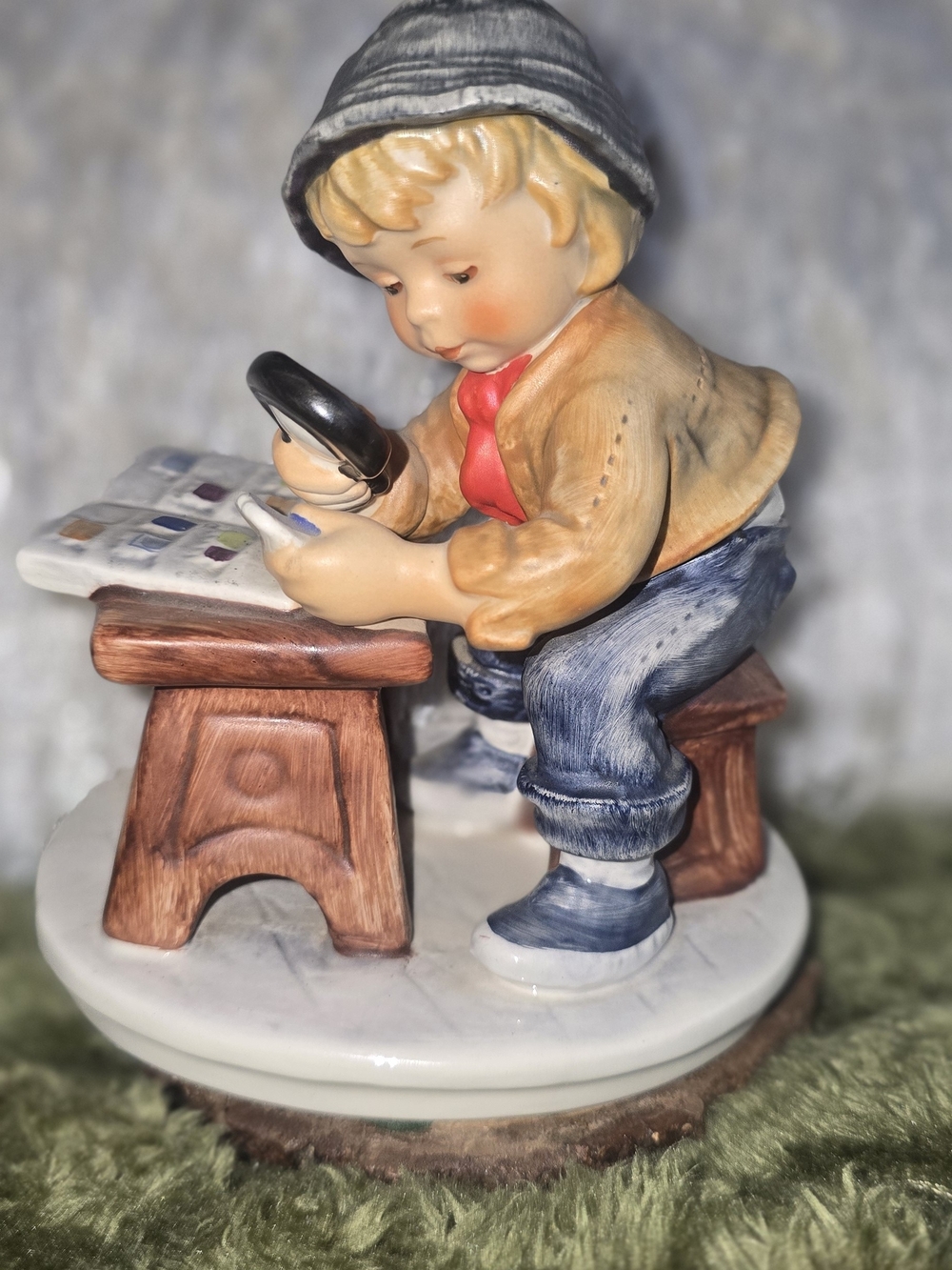 Goebel Porcelain Boy with Magnifying Glass - Blue/Red/Beige/Gray